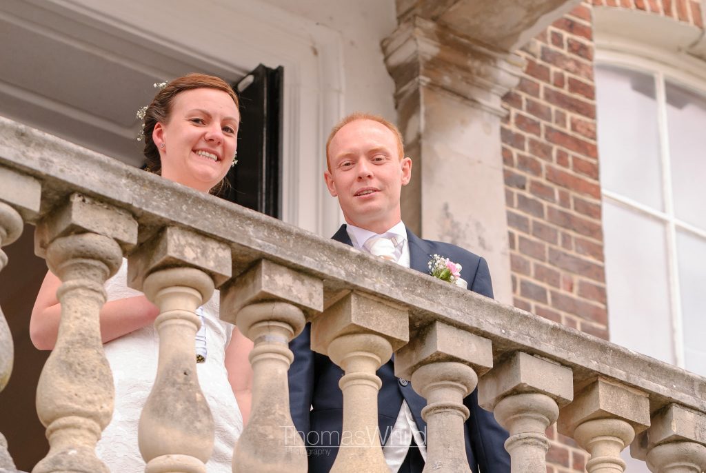 Newlyweds emerge from the ceremony at Poole Guildhall | Dorset Wedding Photographer | Thomas Whild Photography