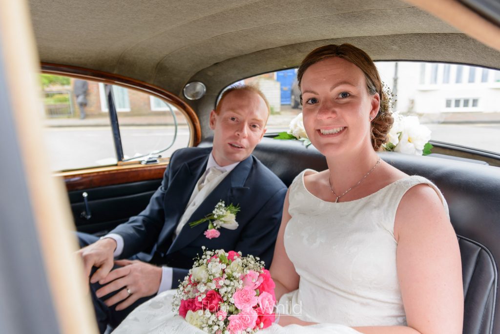 Bride and Groom in their vintage wedding car | Poole Wedding Photographer | Thomas Whild Photography