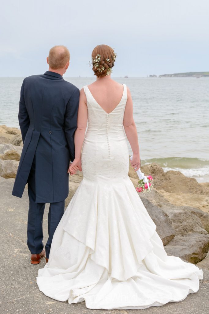 Bride and Groom looking towards the Purbeck Hills | Dorset Wedding Photographer | Thomas Whild Photography