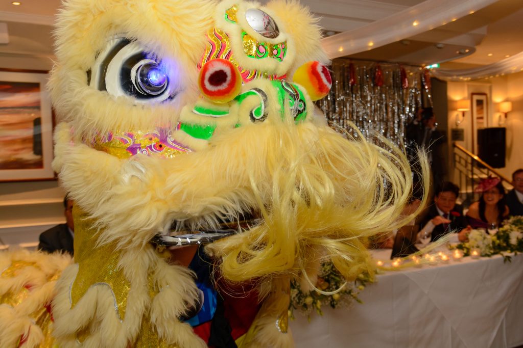 Chinese lion dance at The Sandbanks Hotel, Poole | Dorset Wedding Photographer | Thomas Whild Photography 