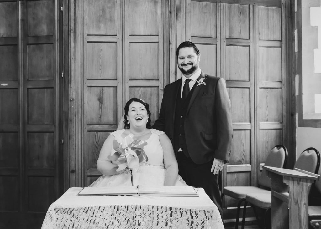 The bride and groom signing the register | Bournemouth Wedding Photographer | Thomas Whild Photography
